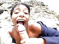 Latina sucks his cock out by the water