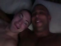Amateur interracial couple cuddling in bed