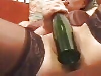 Mature french girl in stocking use wine bottle as